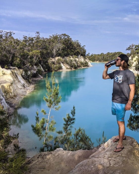 drinking coffee at the little blue lake in north east tasmania, admiring the bright blue tinge created by aluminium in water