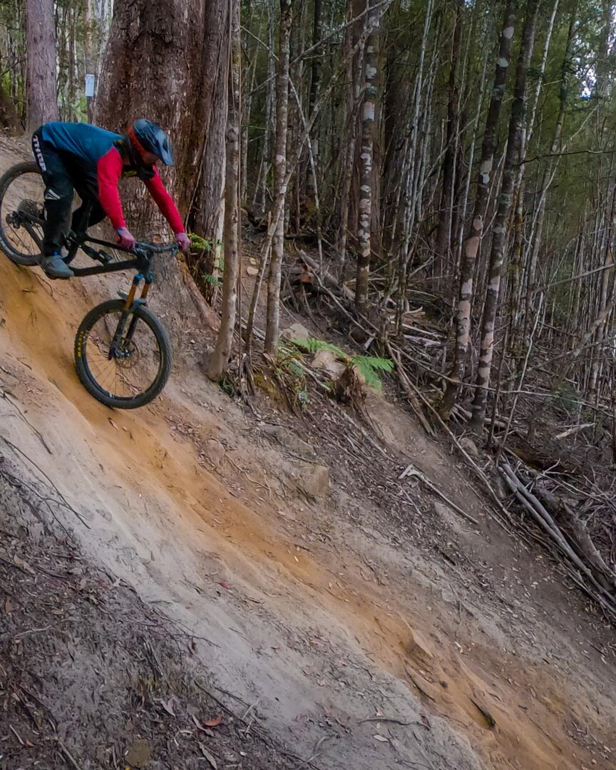 Sending it down a steep section on King Brown at Maydena Bike Park