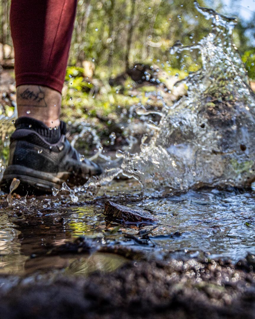 Walking through a puddle in my Salomon XA Discovery GTX Trail Runner Hiking Shoes