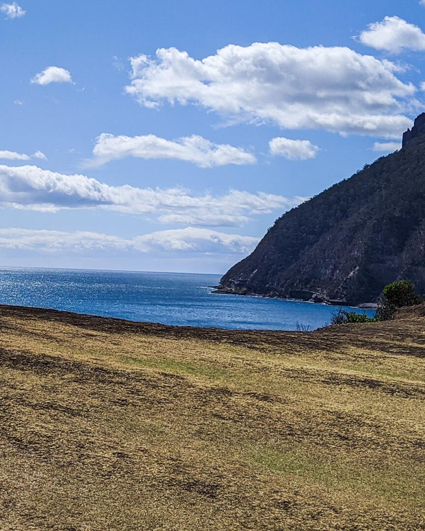 Cycling along the cliffs of Maria Island