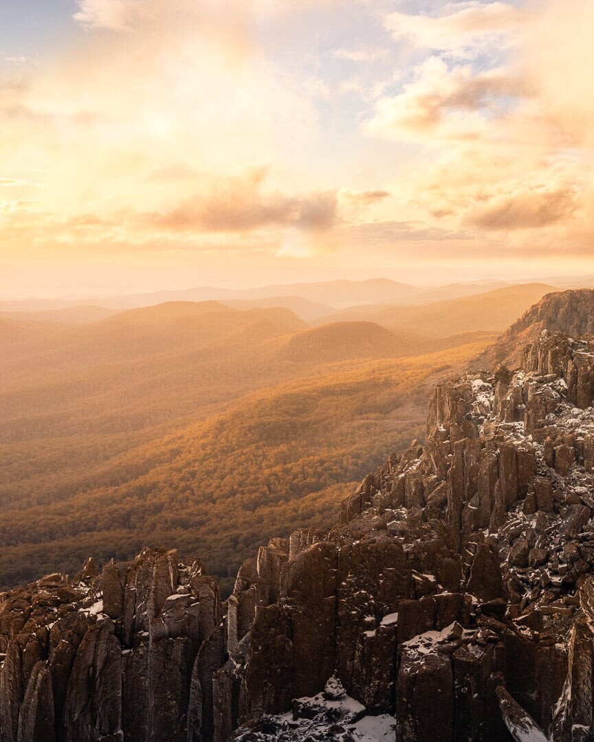 Beautiful golden hour sunset over the pillars of Stacks Bluff in Ben Lomond National Park