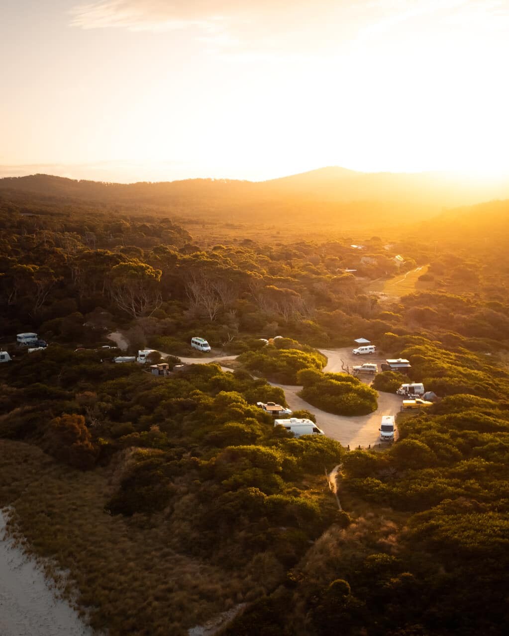 Sunset over Jeanneret Beach Campsite while camping in the Bay of Fires Tasmania