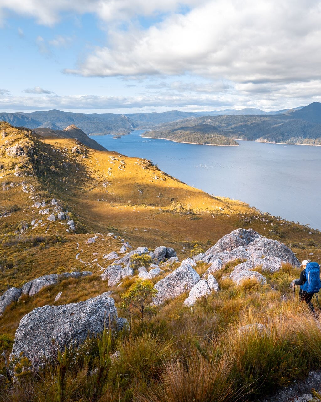 Hiking down from the summit of Mt Farrell towards Lake Mackintosh