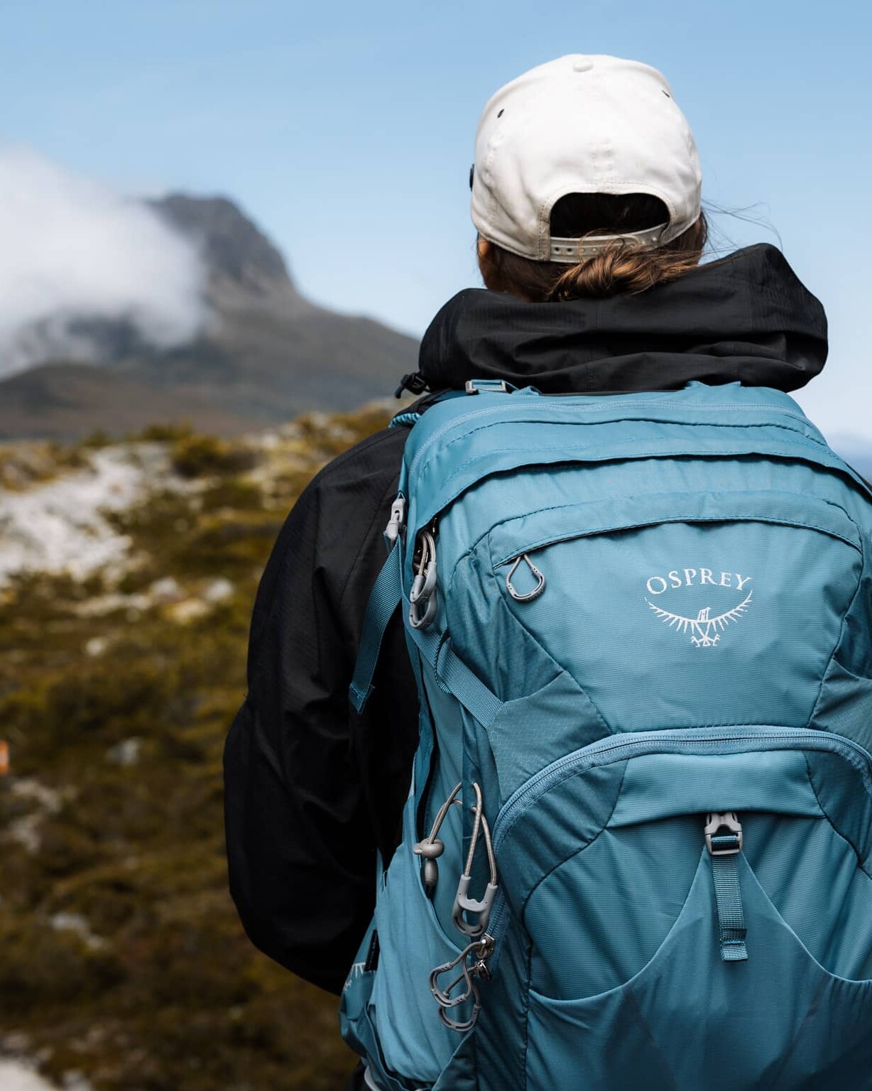 Hiking to Barn Bluff in Cradle Mountain wearing the Osprey Mira 32L Hiking Pack
