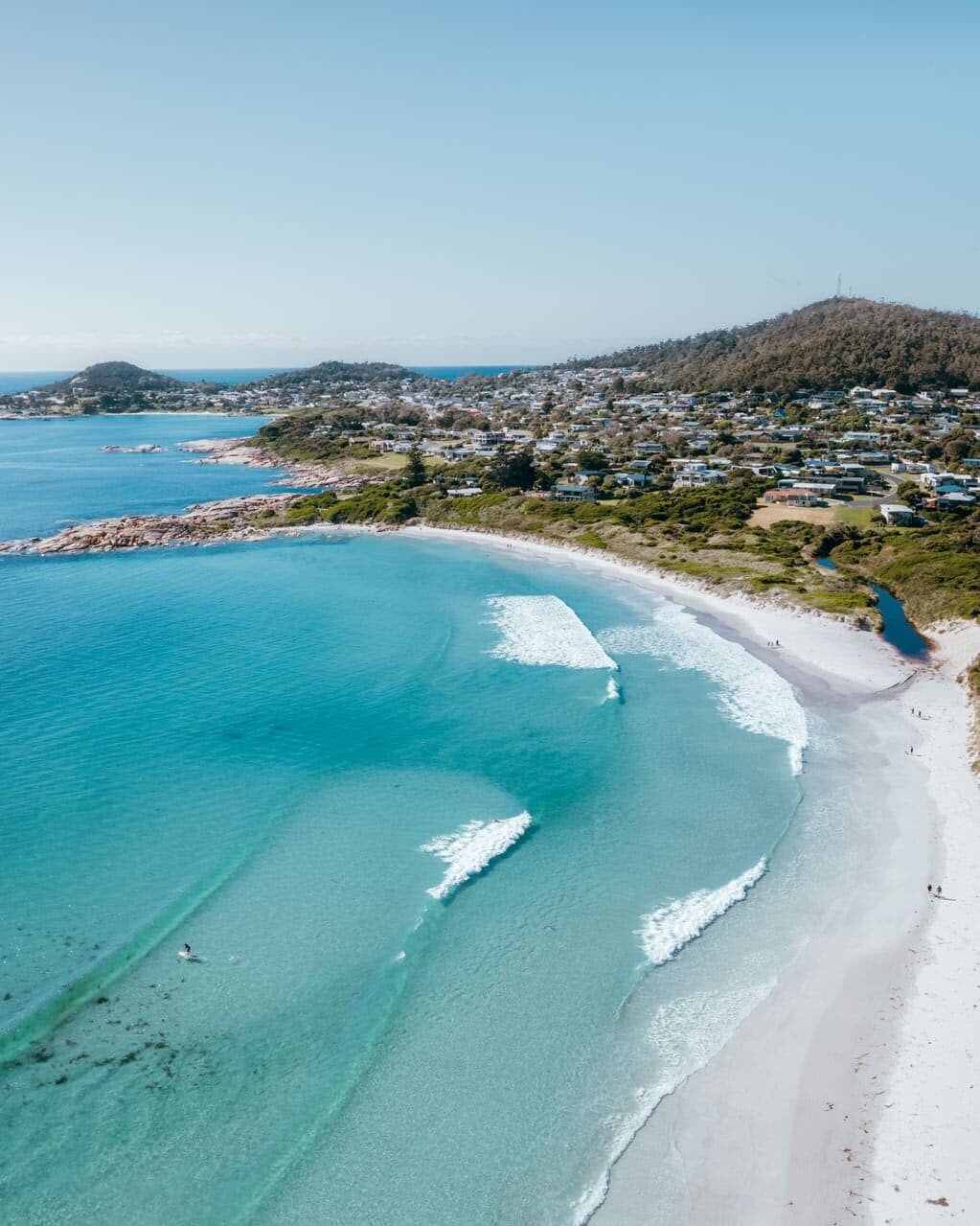 Turquoise waters in Bicheno at Redbill Beach, one of the best beaches on the East Coast of Tasmania