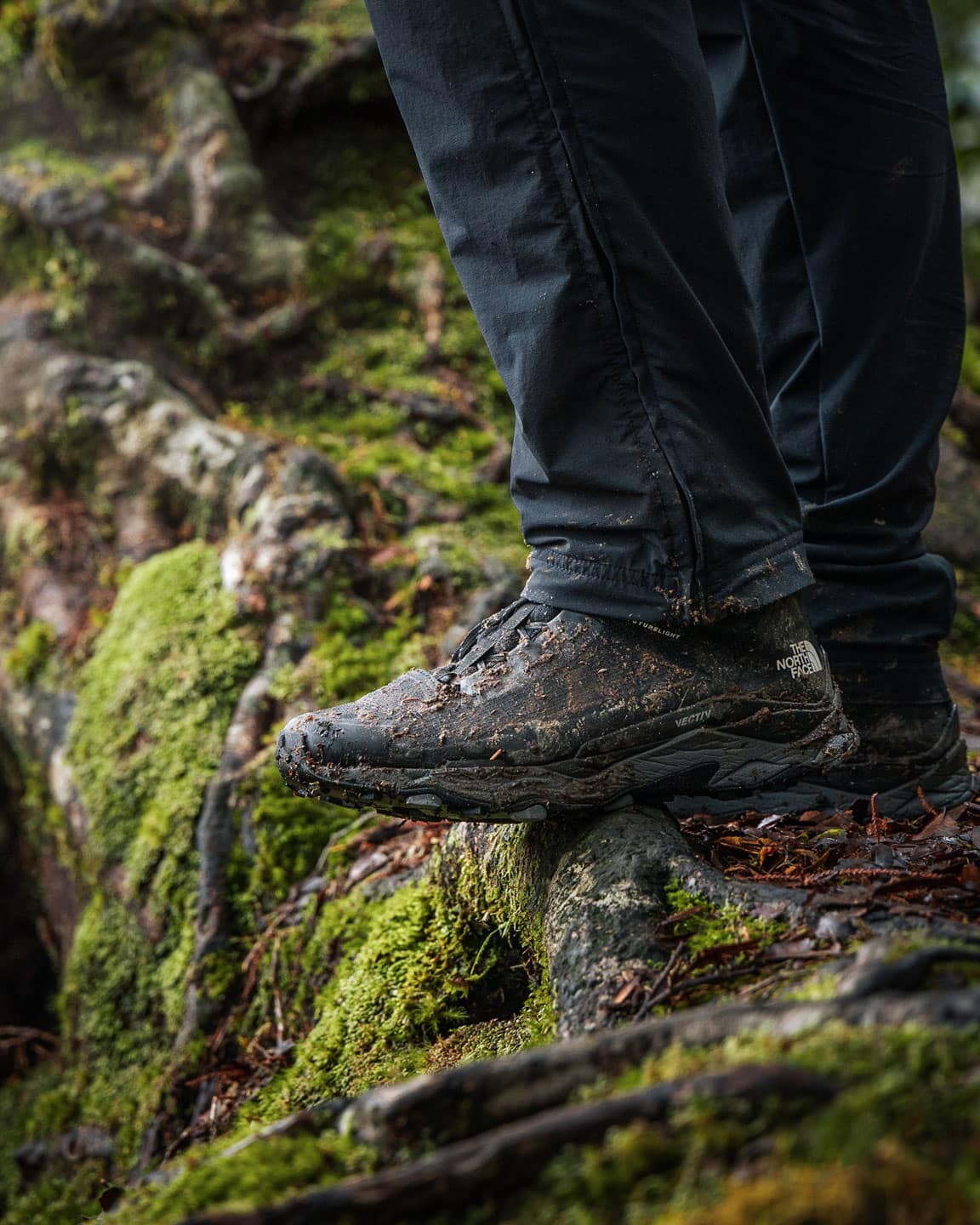 The North Face Vectiv Exploris Mid Futurelight Boots covered in mud